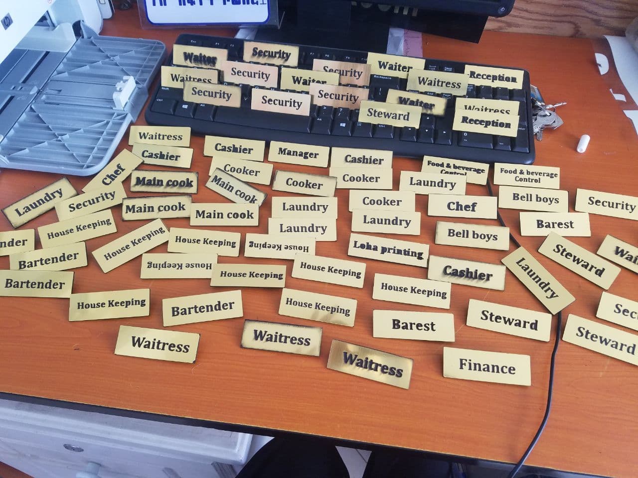 Engraved brass staff name tags